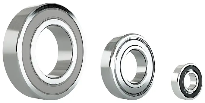 Three different sized thin section ball bearings.