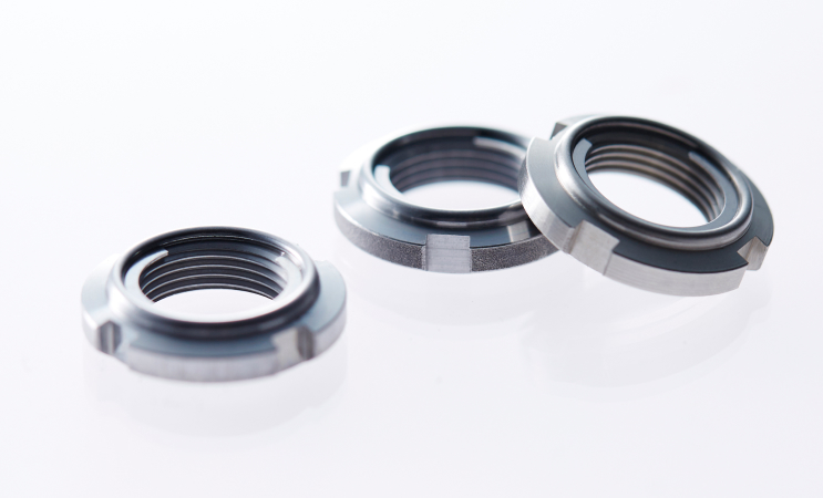 Fuji Fine U-Nut precision locknuts shown from multiple angles.