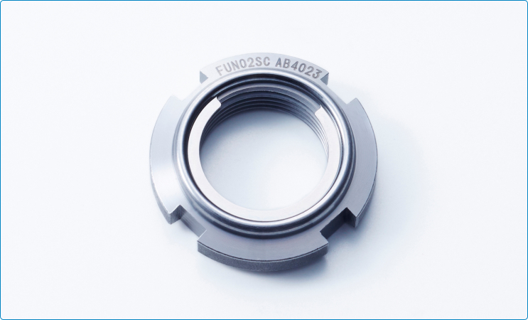 Close-up of Fuji Fine U-Nut showing threaded bore and locking design.