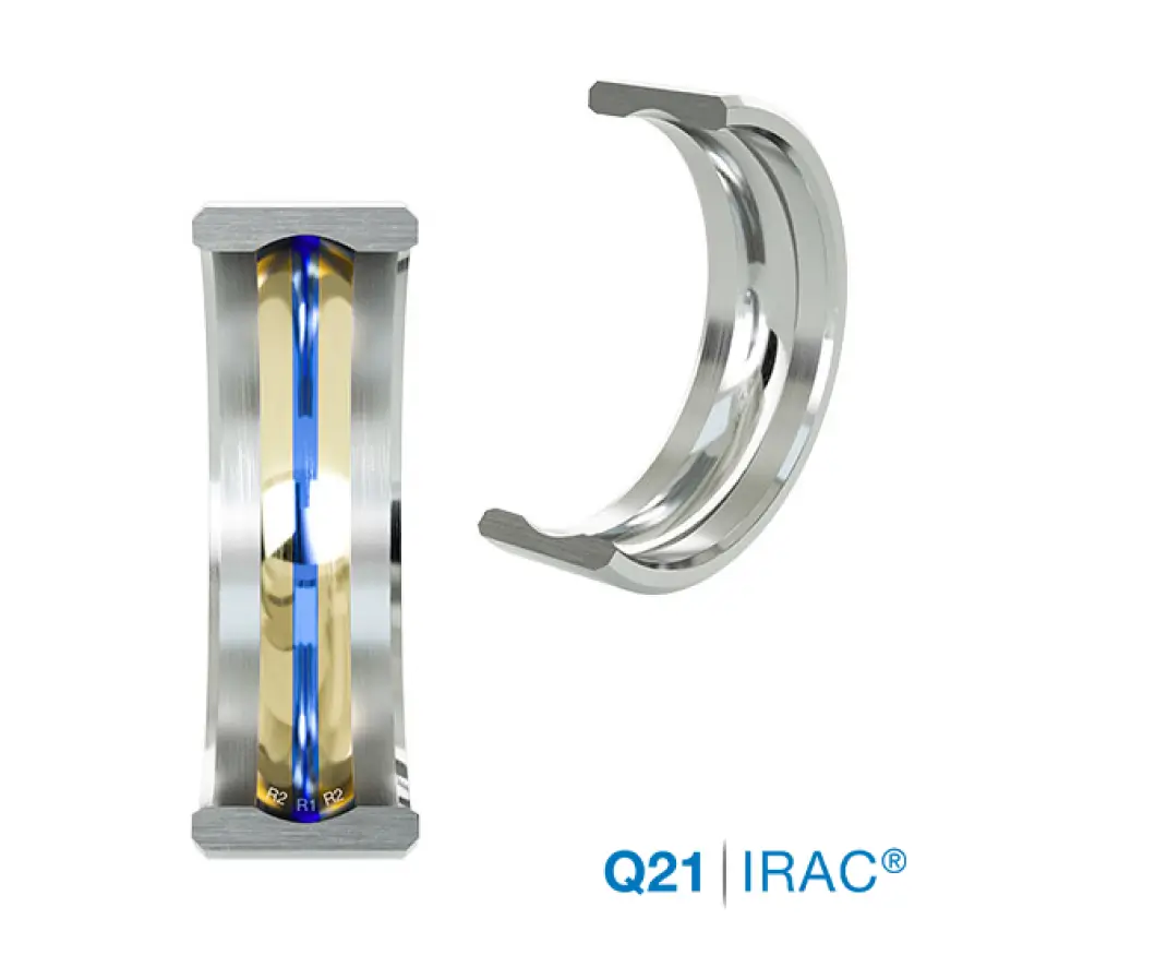 Cross-section diagram and outer ring component of the GRW Q21 IRAC® bearing, showing the gold-coloured roller element with blue-highlighted contact zones and labelled radius measurements R1 and R2, against a white background.